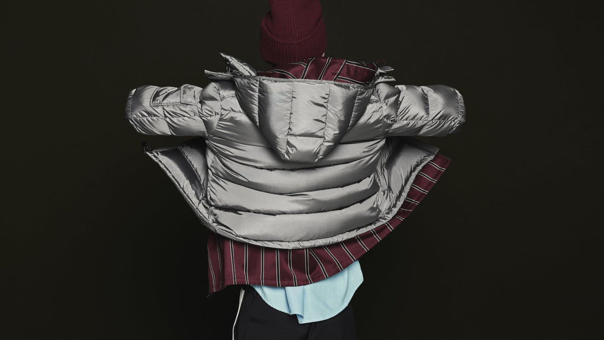 a man posing in a winter jacket 