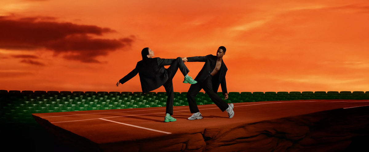 Models in an artistic pose in Lacoste new sneaker