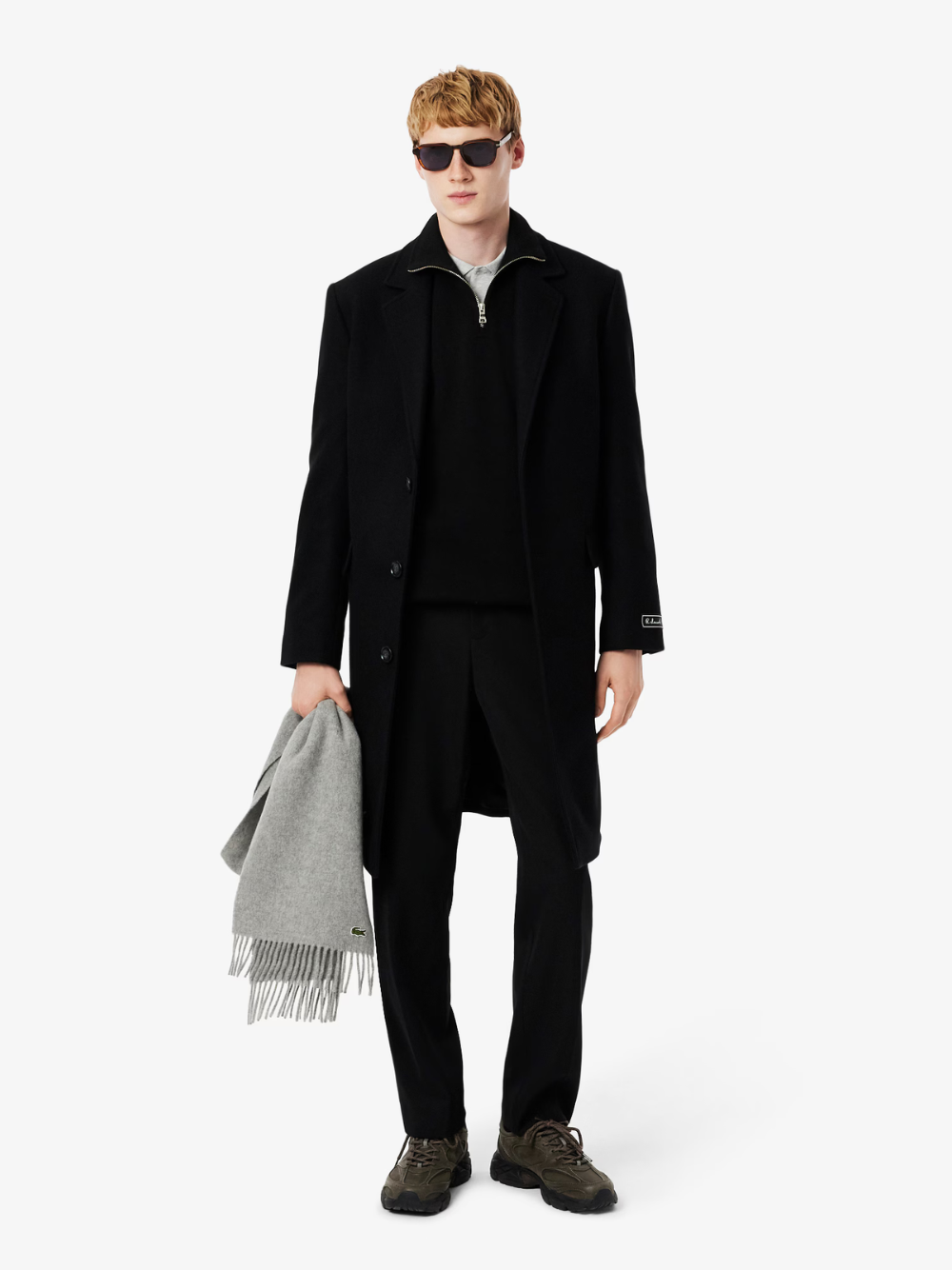 LACOSTE black zip-up sweatshirt side profile highlighting high neck collar and athletic fit silhouette